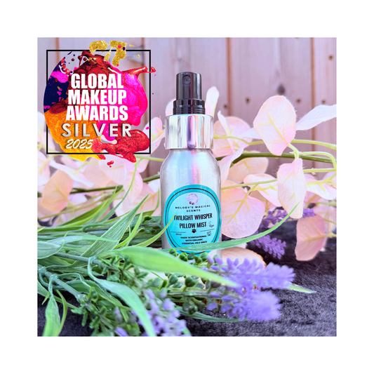 Bottle of 'Pillow Whisper' with decorative flowers and 'Global Makeup Awards Silver 2023' badge.