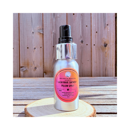 Silver spray bottle with pink label on a wooden surface "Calm Wave 30ml"