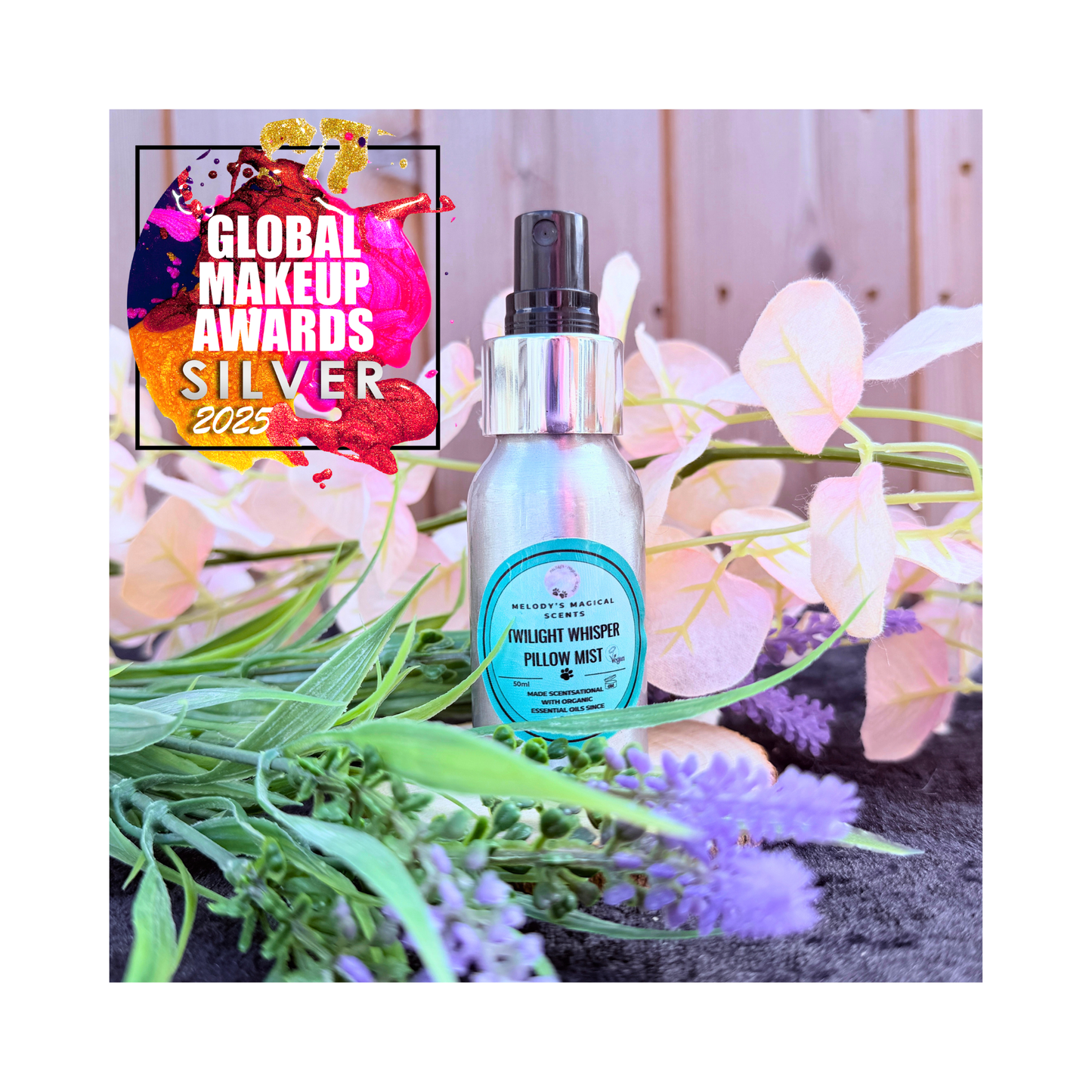 Bottle of 'Pillow Whisper' with decorative flowers and 'Global Makeup Awards Silver 2023' badge.
